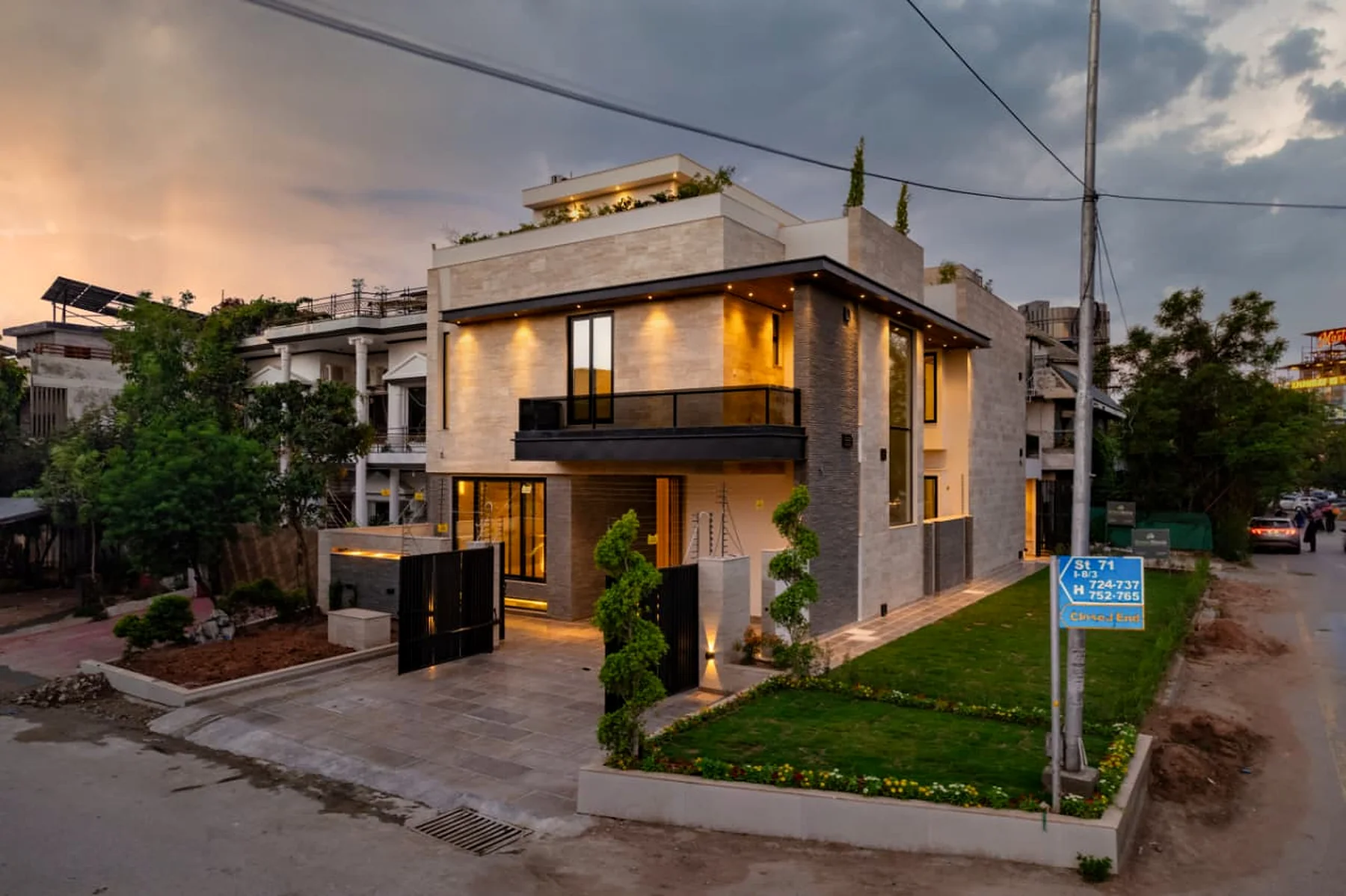 A completed GreenStone residence lit at dusk
